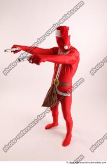 JOEL_ADAMSON CHRISTMAS VILLAIN WITH TWO GUNS